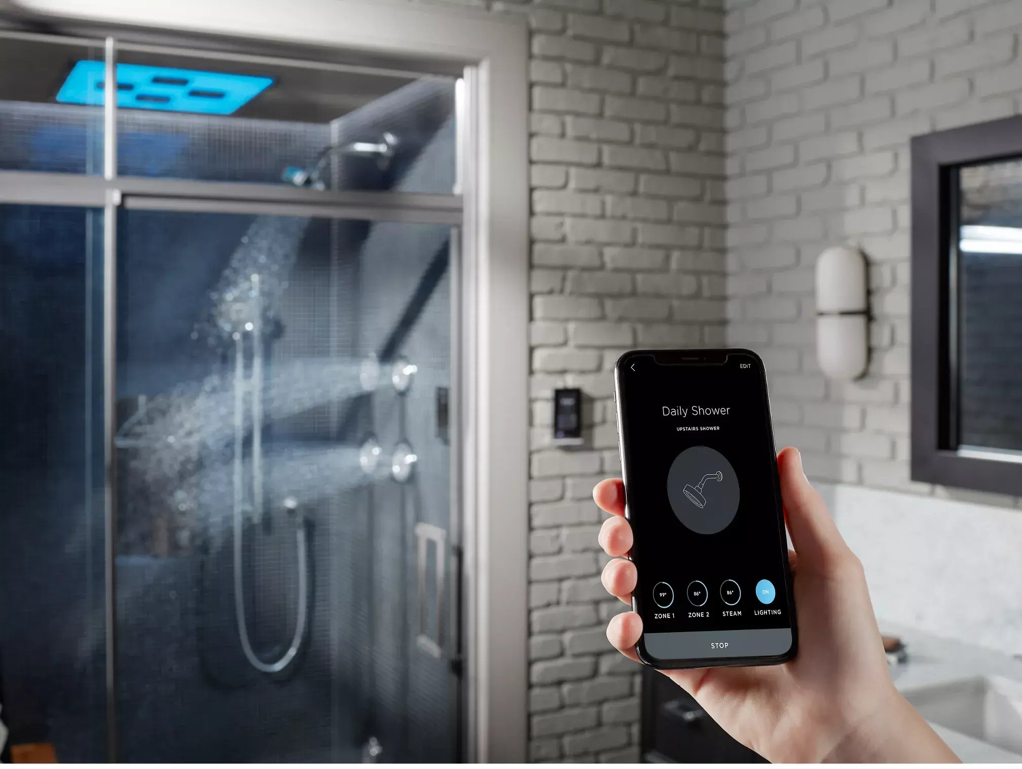 Smart shower controlled by KOHLER Konnect app in modern Denver bathroom remodel