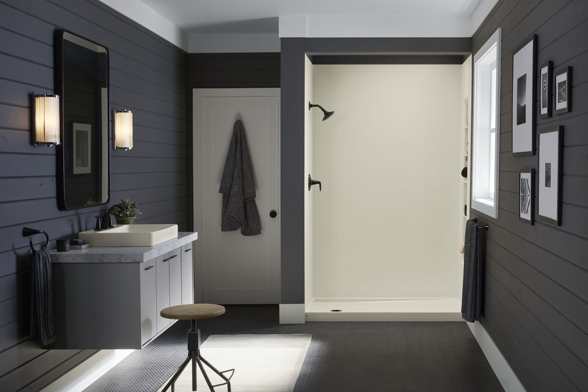 Contemporary bathroom remodel in Denver featuring walk-in shower with matte black fixtures and floating vanity