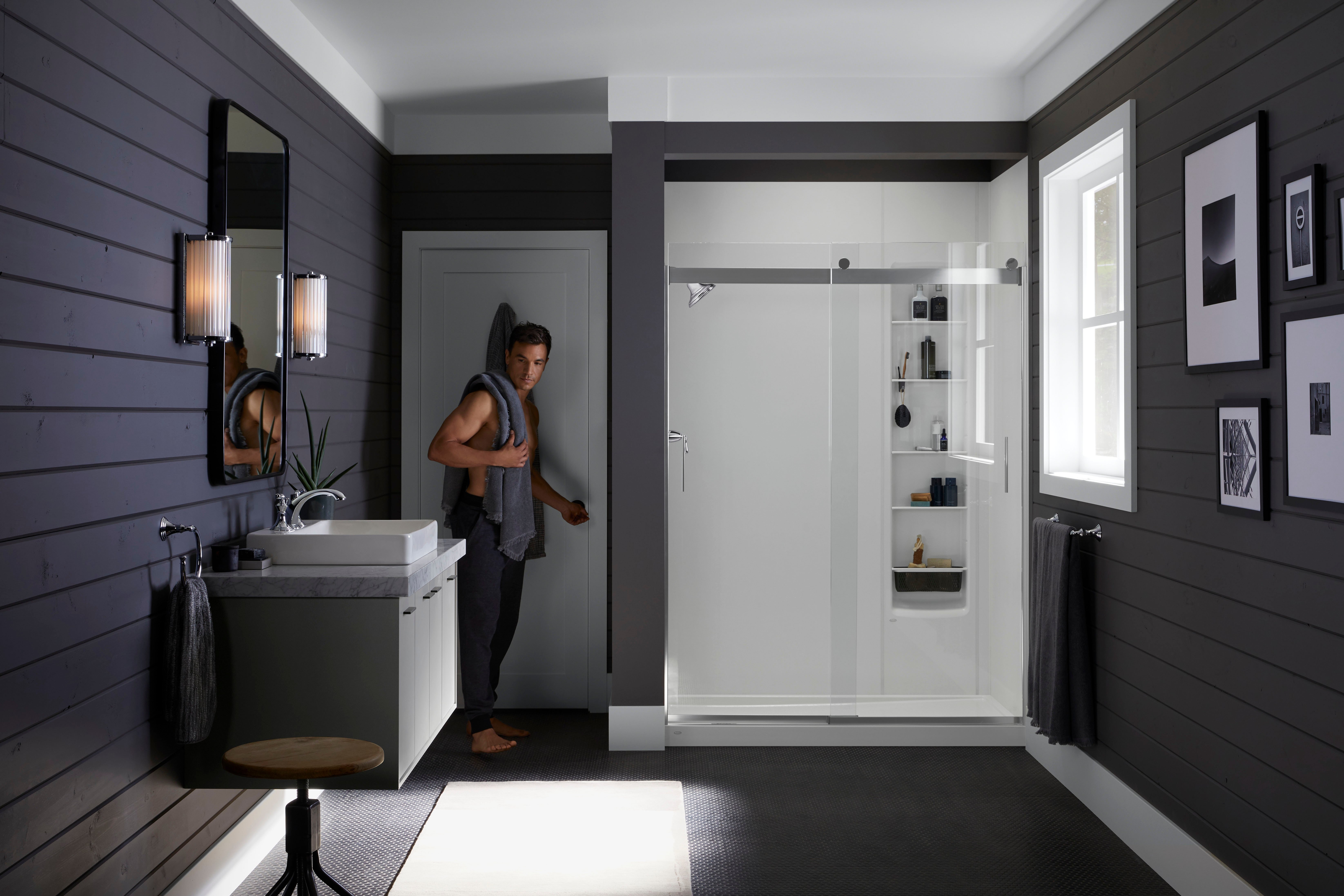 Modern Denver bathroom remodel with KOHLER LuxStone walk-in shower and floating vanity